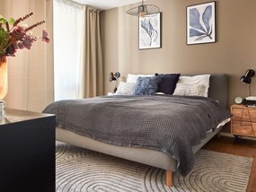 Szare tapicerowane łóżko dwuosobowe ze schowkiem ze stelażem 180x200 cm Mattis – Meise Möbel