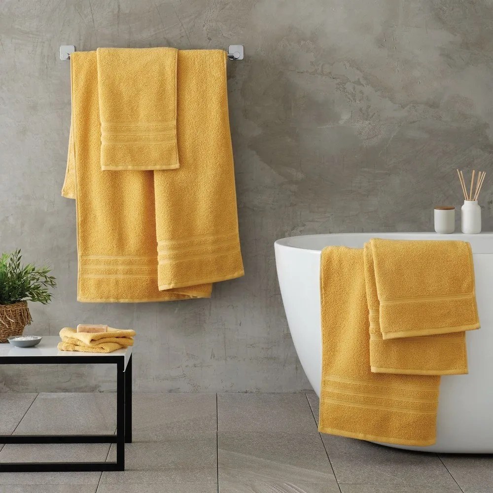 Żółte bawełniane ręczniki kąpielowe frotte zestaw 2 szt. 90x140 cm Zero Twist – Catherine Lansfield