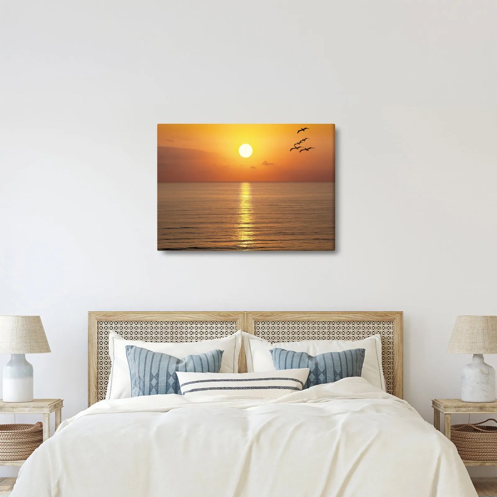 Obraz - Zachód słońca nad oceanem (70x50 cm)