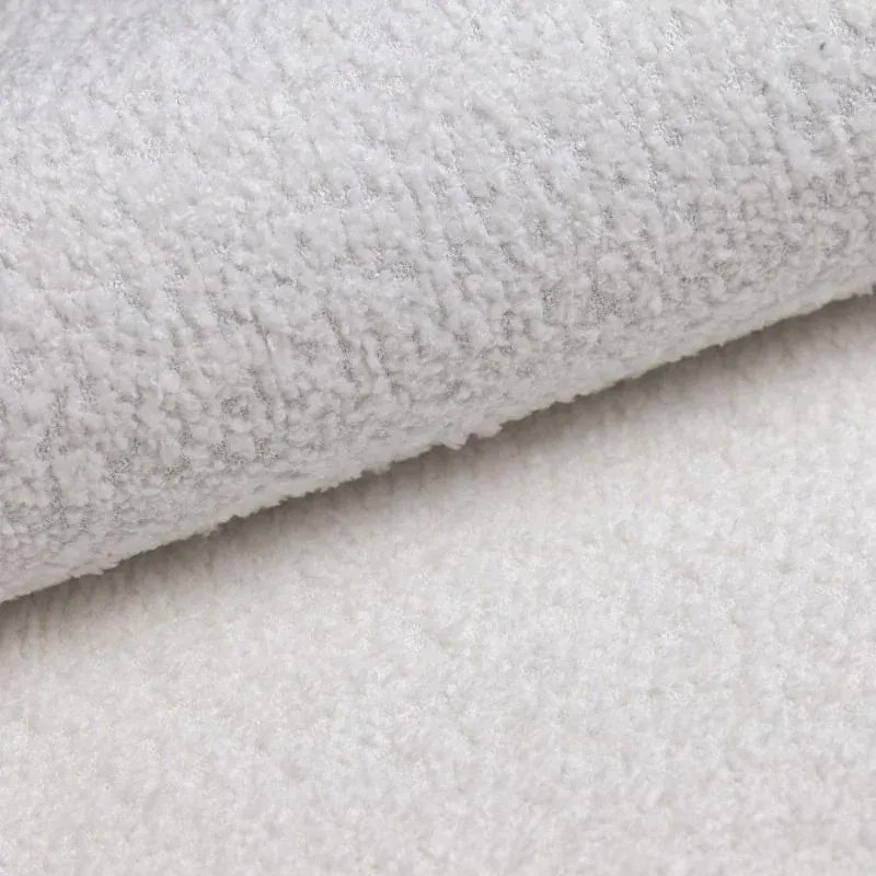 Biały puf z materiału bouclé Ariella – Ropez