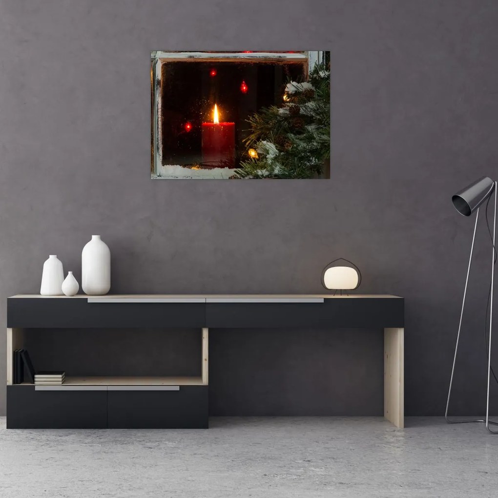 Obraz na szkle - Świecąca świeca bożonarodzeniowa (70x50 cm)