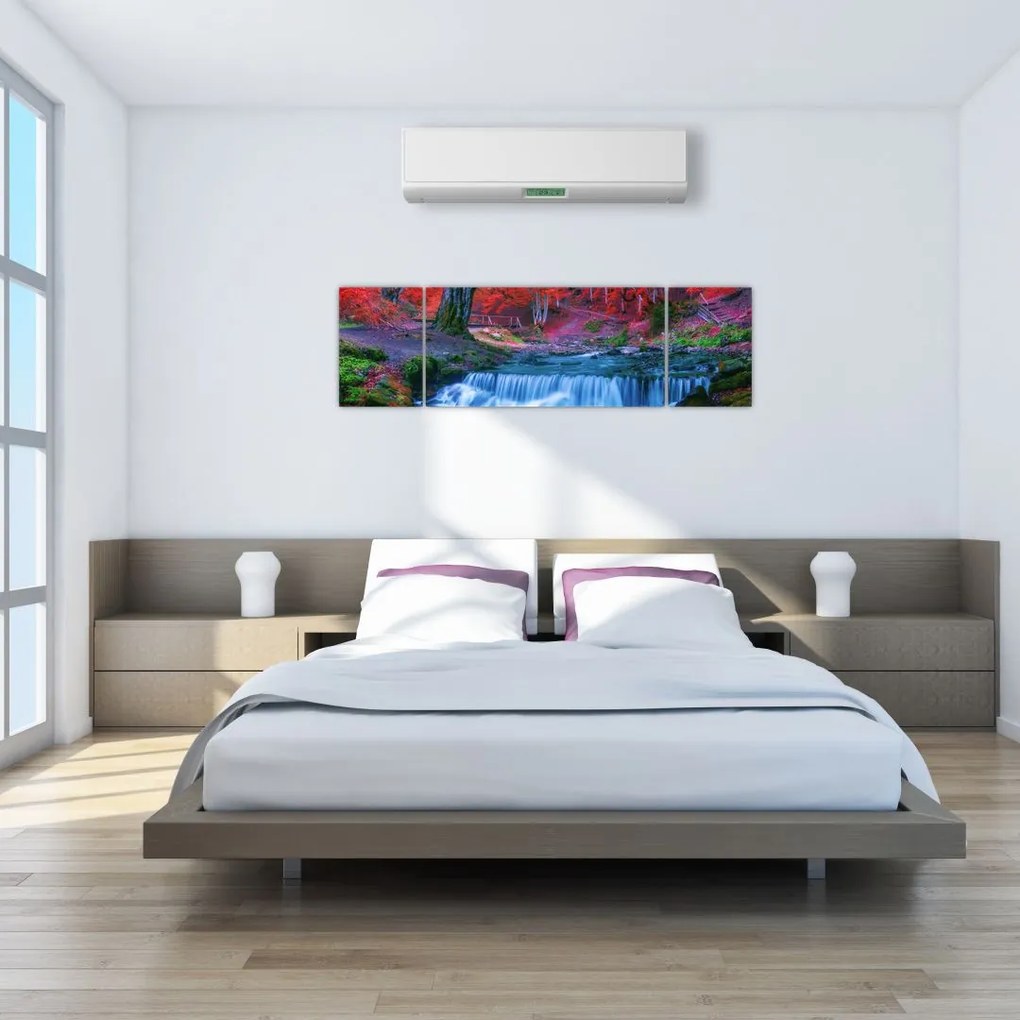 Obraz wodospadu w czerwonym lesie (170x50 cm)