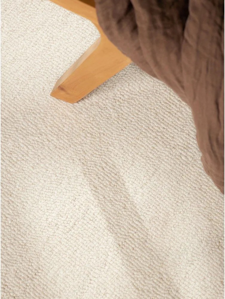 Kremowy wełniany dywan tkany ręcznie 200x290 cm Puristic Knots – Elle Decoration