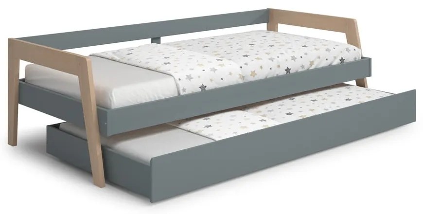Zielone łóżko dziecięce z drewna sosnowego z wysuwanym łóżkiem i schowkiem 90x200 cm Carrie – Marckeric