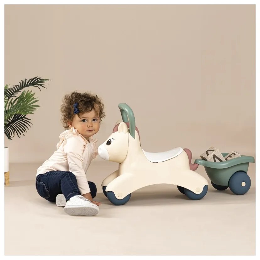 Smoby little pierwszy jeździk pony ride-on kucyk z przyczepką