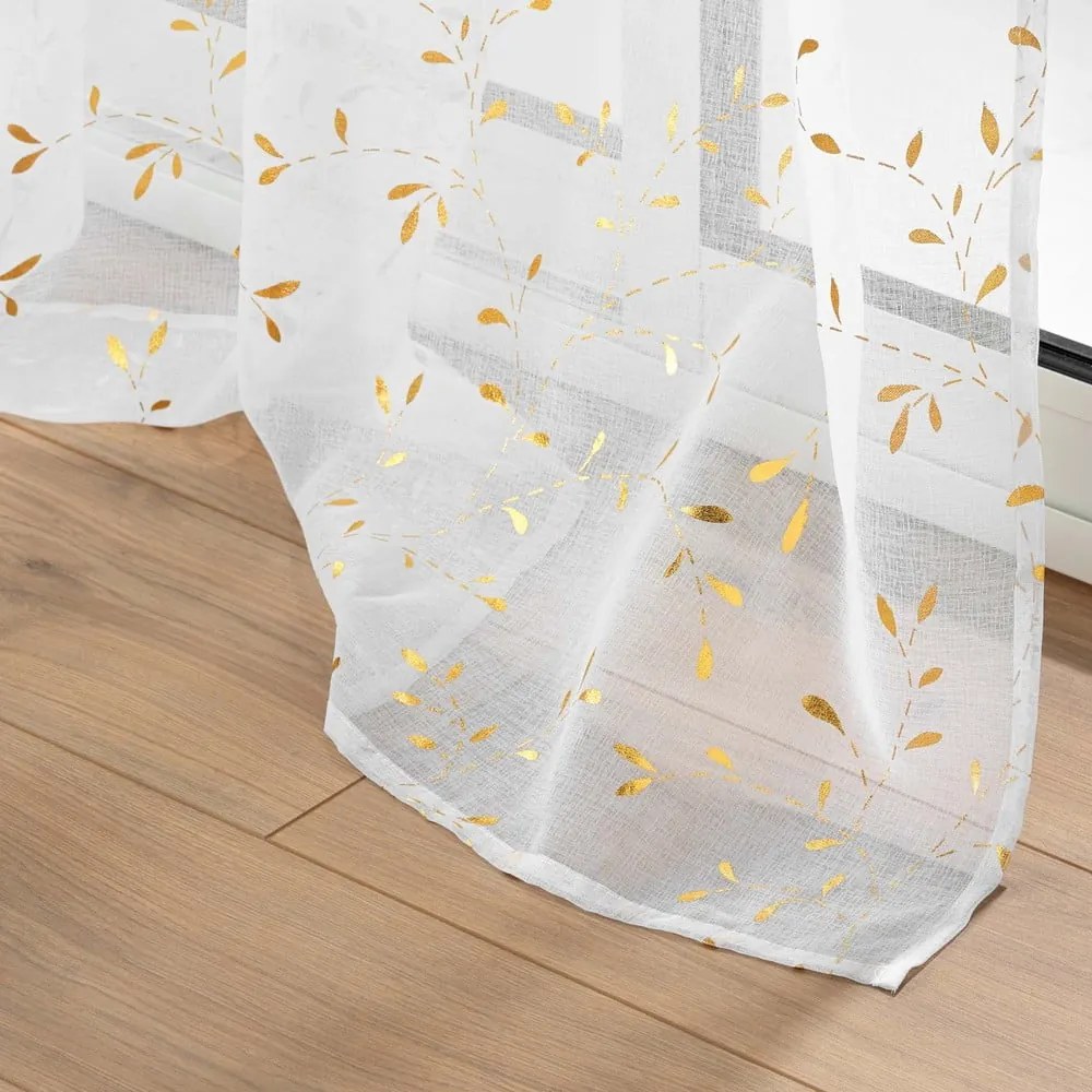 Firanka w biało-złotym kolorze z woalu 140x240 cm Floressia – douceur d'intérieur