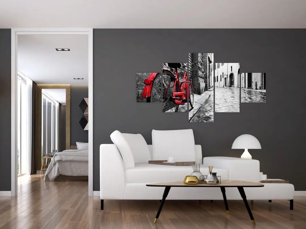Obraz czerwonego roweru na brukowanej uliczce (125x70 cm)