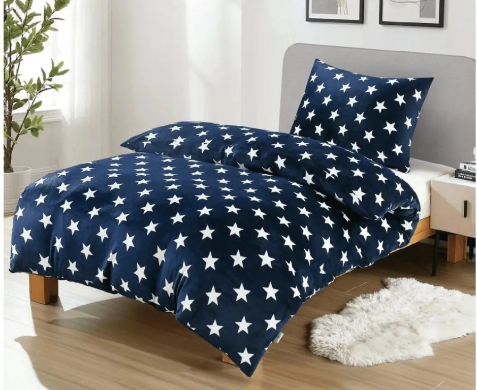 PrzytulneMieszkanie.pl PrzytulneMieszkanie.pl PROMOCJA Pościel z mikropluszu BIAŁE GWIAZDY ciemnoniebieska II. jakość Rozmiar pościeli: 70 x 90 cm | 140 x 200 cm