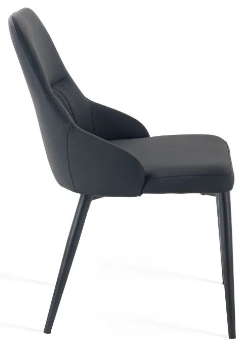 Eleganckie czarne krzesło Monolit tapicerowane ekoskórą PU, wygodne, nowoczesne i idealne do jadalni lub biura. Smukłe metalowe nogi dodają mu lekkości i stylu.
