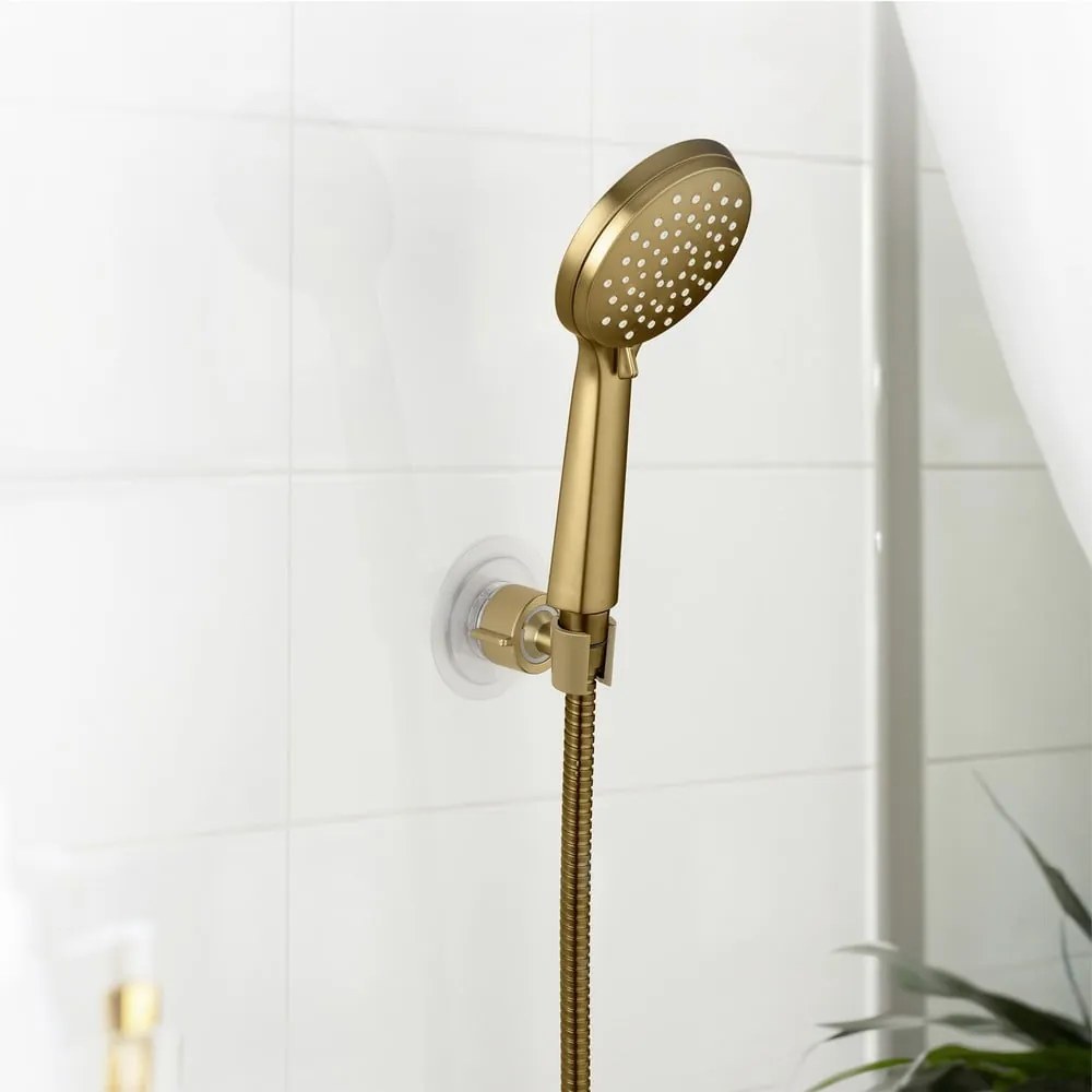 Plastikowy uchwyt na słuchawkę prysznicową w kolorze złota bez wiercenia Libertà – Wenko