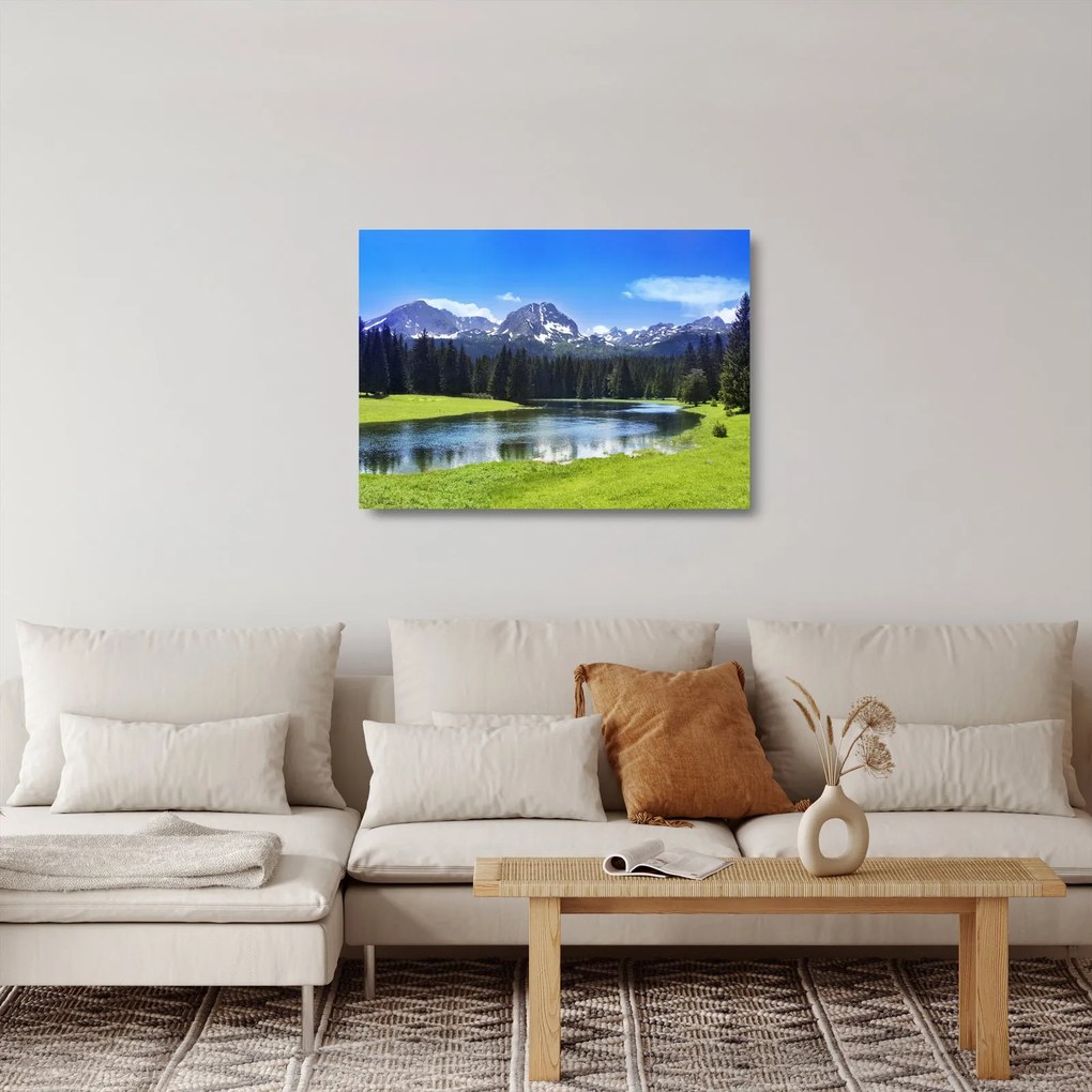 Obraz na szkle - Ośnieżone szczyty górskie (70x50 cm)