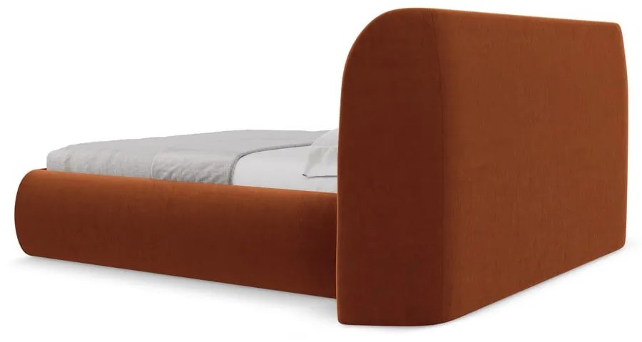 Tapicerowane łóżko dwuosobowe w kolorze terakoty ze schowkiem i stelażem 160x200 cm Hauke – Makamii