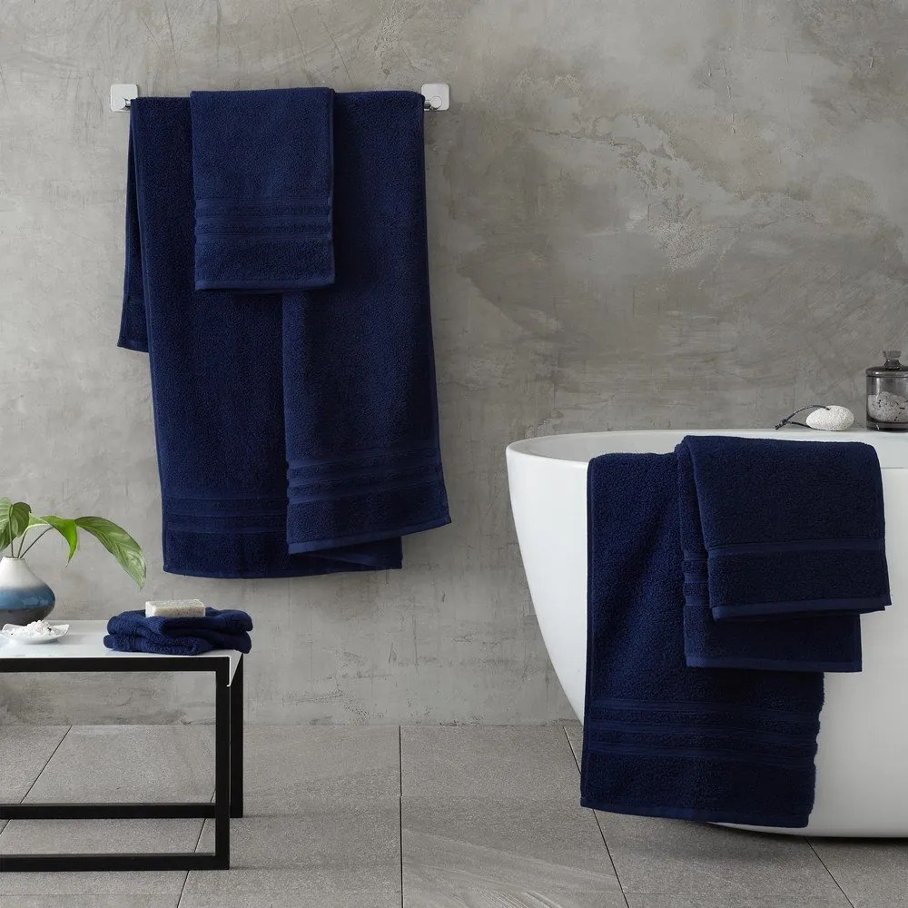 Ciemnoniebieski bawełniany ręcznik frotte 50x85 cm Zero Twist – Catherine Lansfield