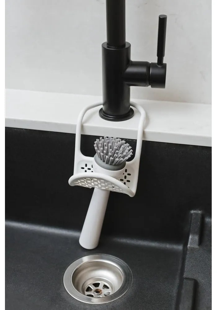 Wiszący plastikowy uchwyt na gąbkę Sling – Umbra