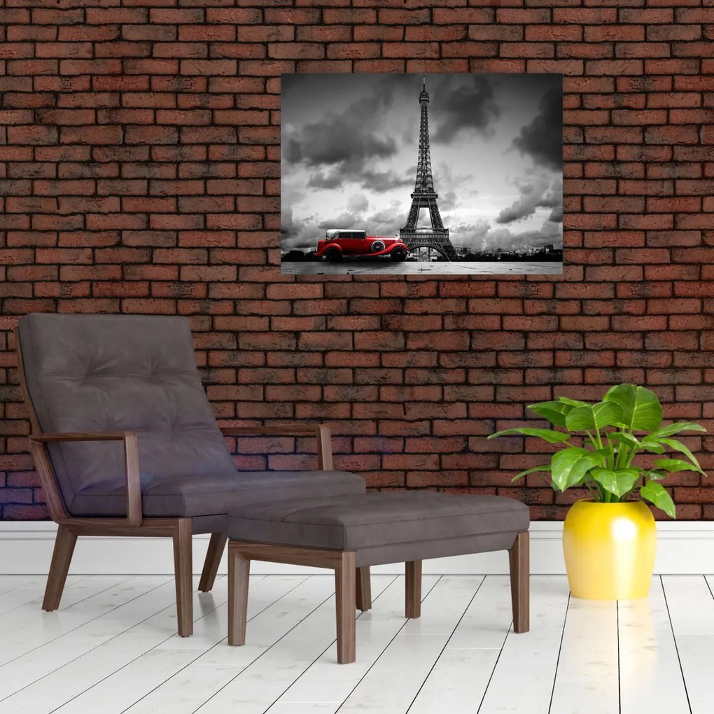 Obraz na szkle - Wieża Eiffla i czerwony samochód (70x50 cm)