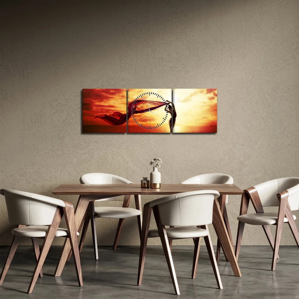 Obraz - Sylwetka kobiety o zachodzie słońca (z zegarem) (90x30 cm)