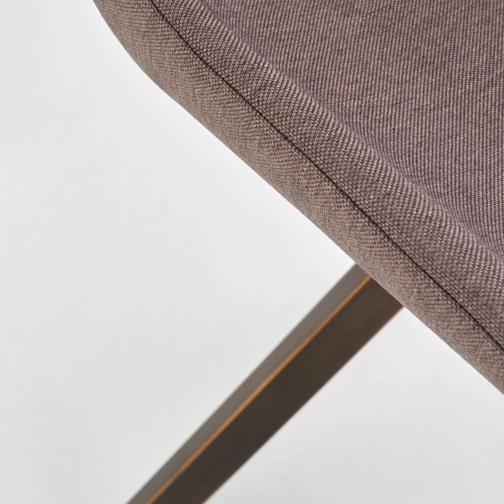 Krzesło tapicerowane tkaniną na stalowych nogach K290