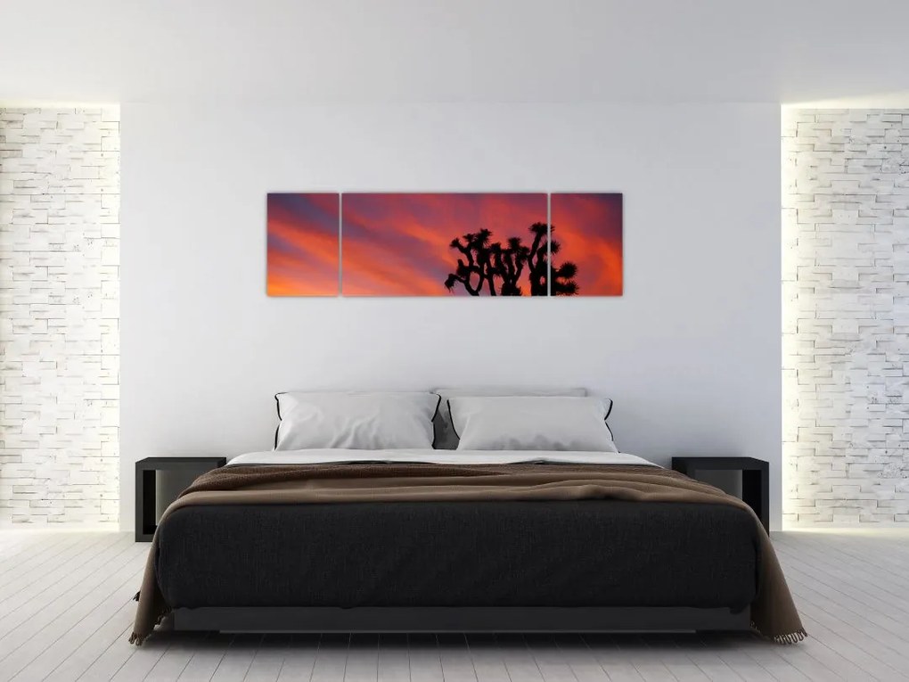 Obraz zachodu słońca nad sylwetką drzewa (170x50 cm)