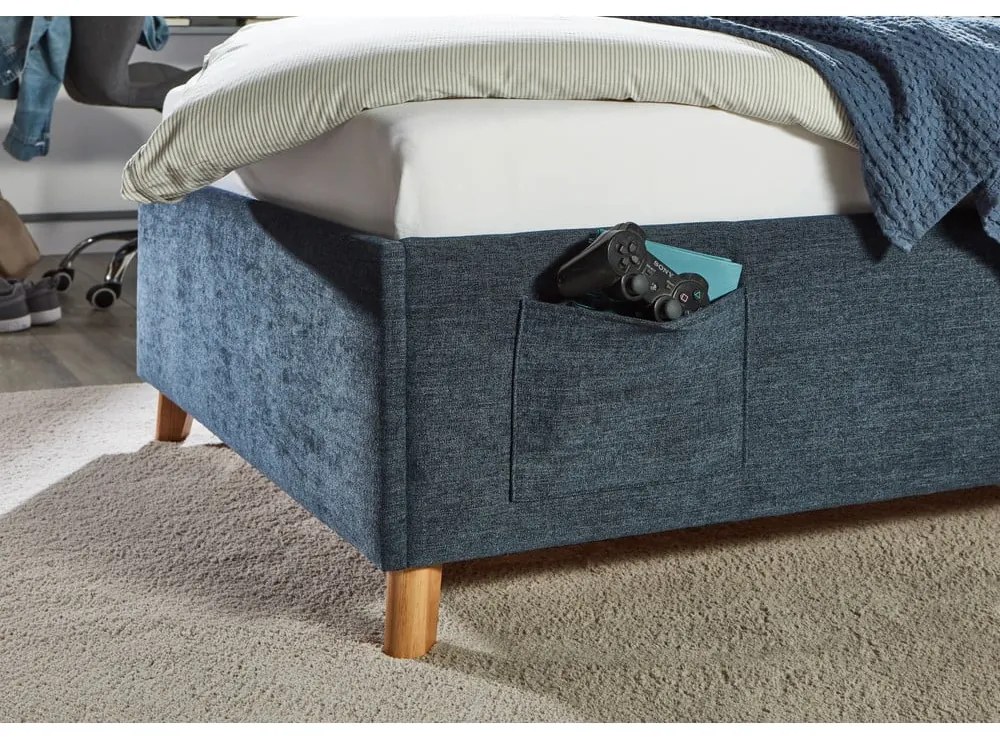 Ciemnoniebieskie tapicerowane łóżko dziecięce ze schowkiem ze stelażem 120x200 cm Fun – Meise Möbel