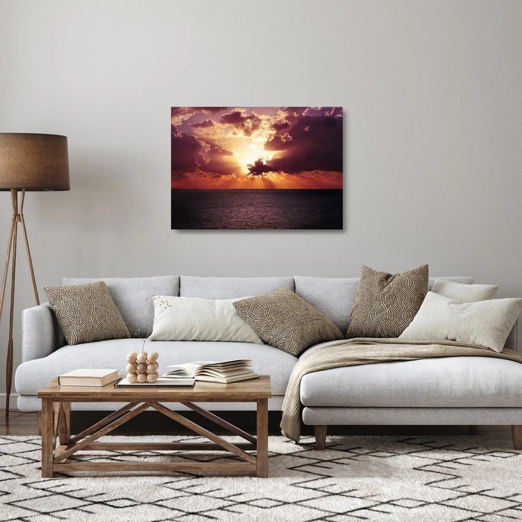 Obraz na szkle słońca za chmurami (70x50 cm)