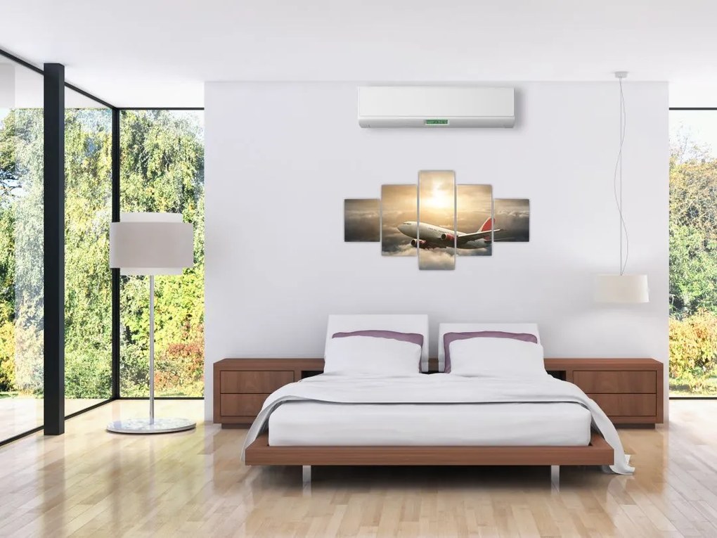 Obraz - Samolot w chmurach (125x70 cm)