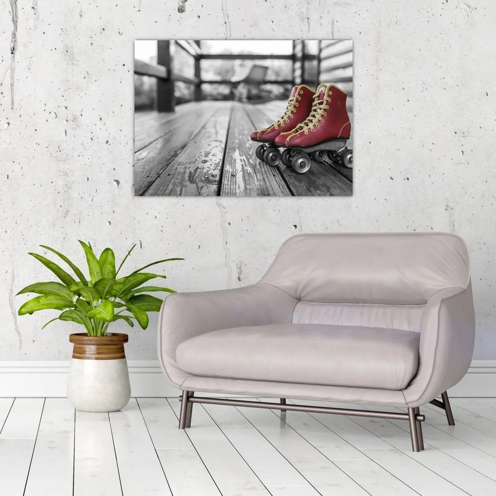 Obraz na szkle - czerwone stare wrotki (70x50 cm)