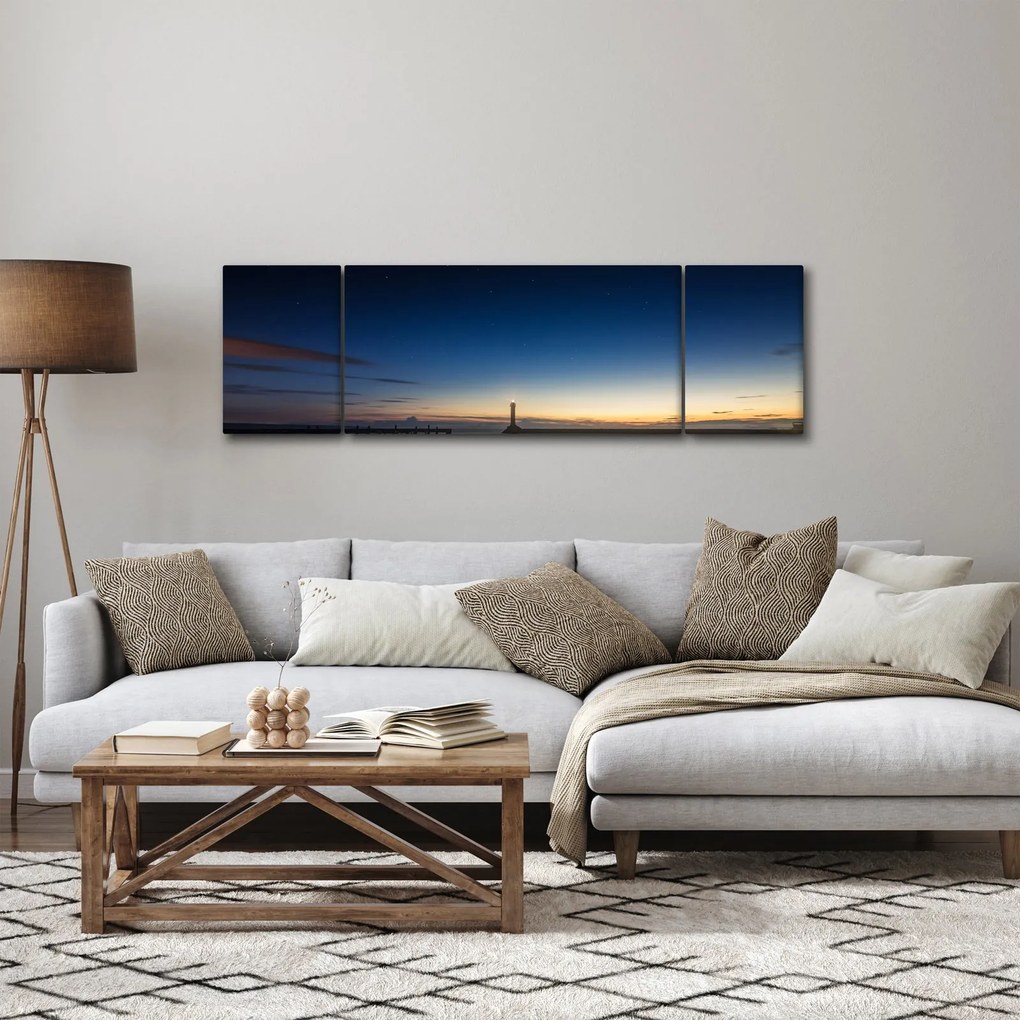 Obraz latarni morskiej w oddali (170x50 cm)