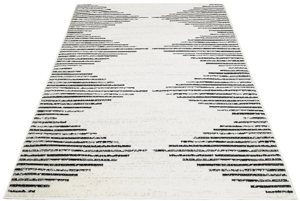 Prostokątny kremowy dywan w nowoczesny wzór C3-D74