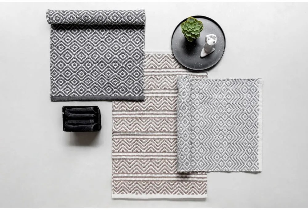 Beżowy tekstylny dywanik łazienkowy 50x80 cm Shaki – Wenko