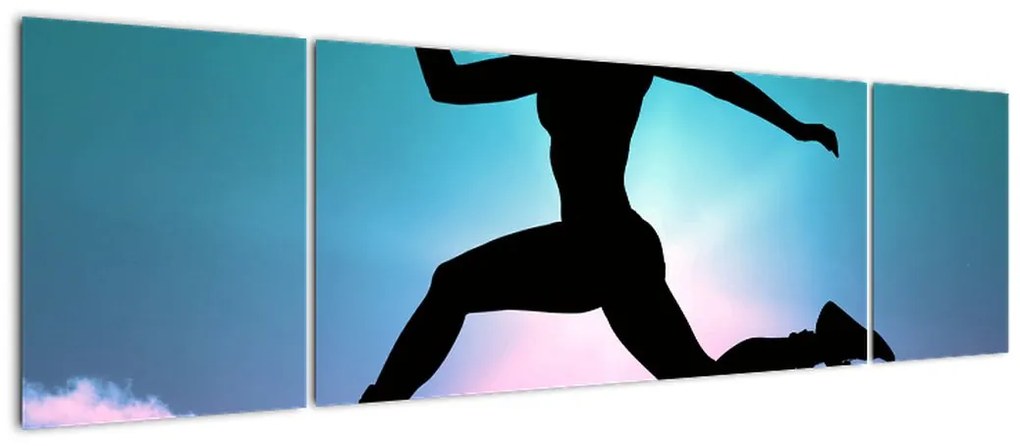 Obraz skaczącej sylwetki kobiety (170x50 cm)