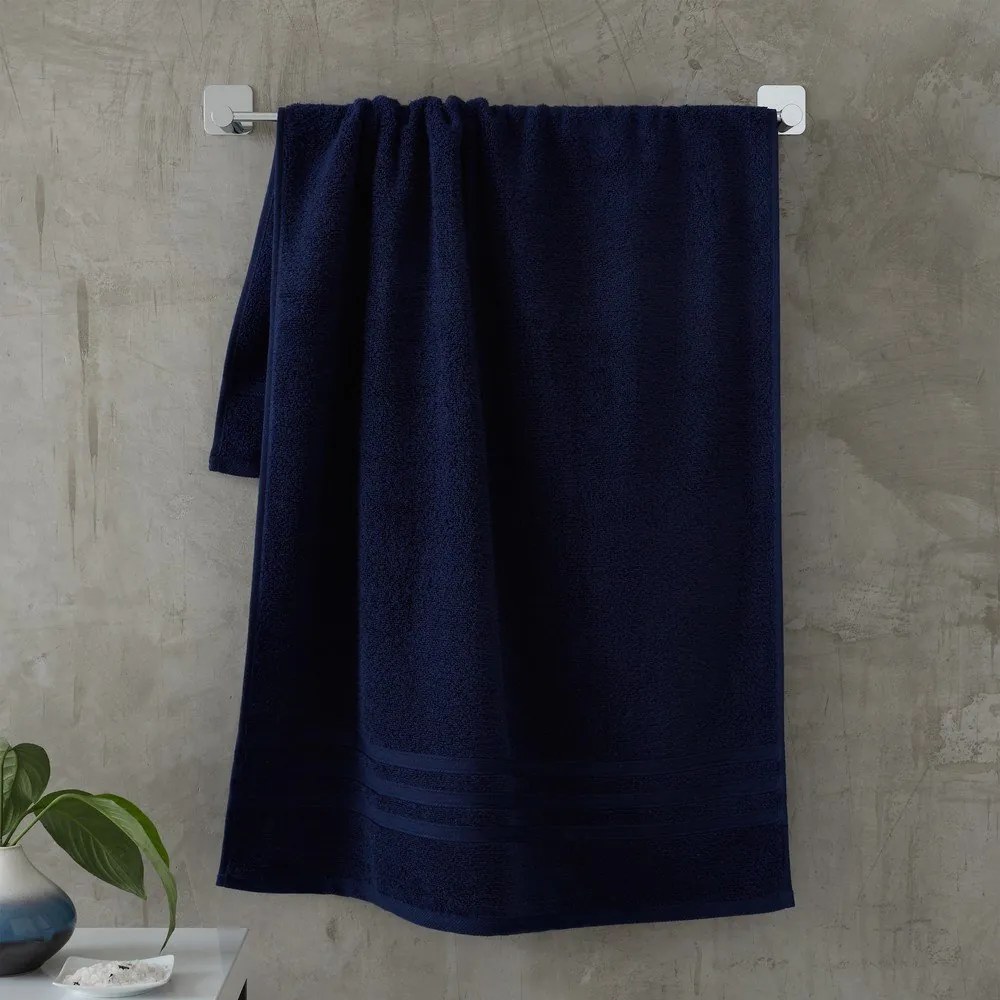 Ciemnoniebieski bawełniany ręcznik frotte 50x85 cm Zero Twist – Catherine Lansfield