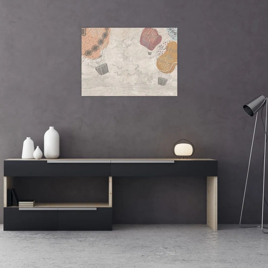 Obraz na szkle - Balony nad miastem, ciepłe odcienie (70x50 cm)