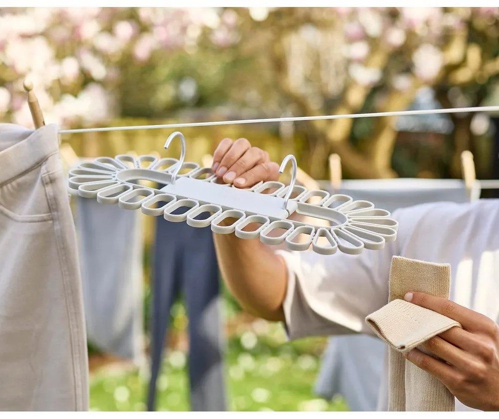 Beżowa wisząca suszarka na pranie Petal – Joseph Joseph