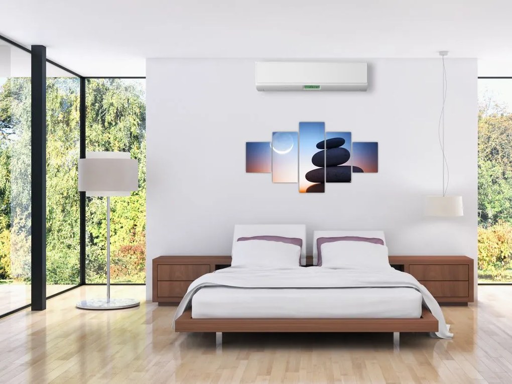 Obraz ułożonych kamieni jeden na drugim (125x70 cm)