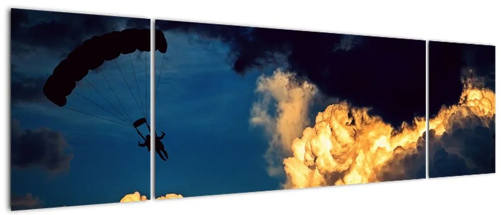 Obraz skoczka spadochronowego w chmurach (170x50 cm)