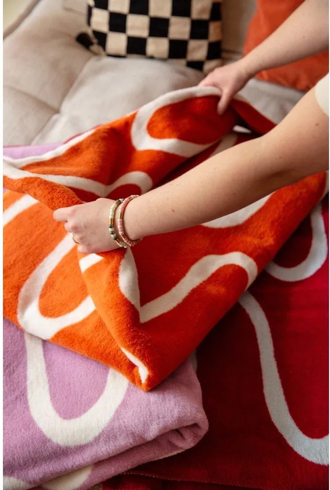 Pomarańczowy koc 150x200 cm Swirl – noo.ma