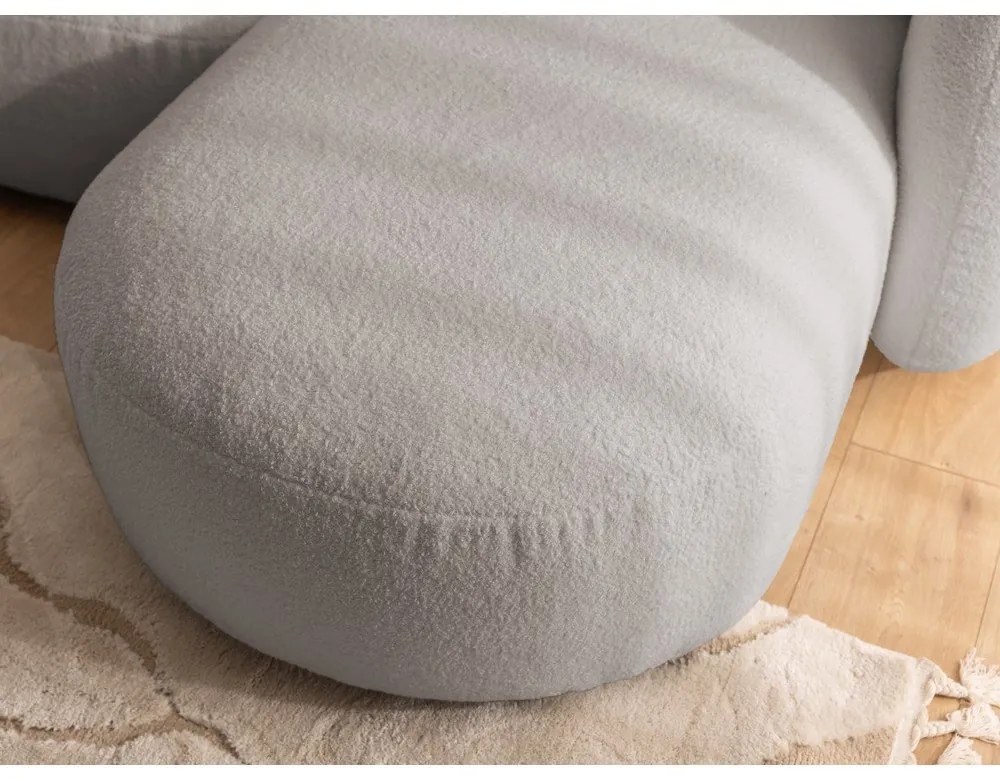 Szary narożnik z materiału bouclé (prawostronny/z szezlongiem) Orbit – Ropez