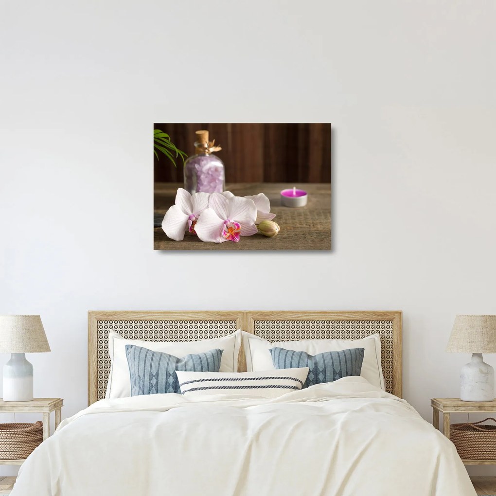 Obraz na szkle - Świeca i orchidee (70x50 cm)