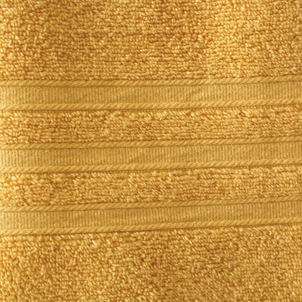 Żółte bawełniane ręczniki kąpielowe frotte zestaw 2 szt. 90x140 cm Zero Twist – Catherine Lansfield