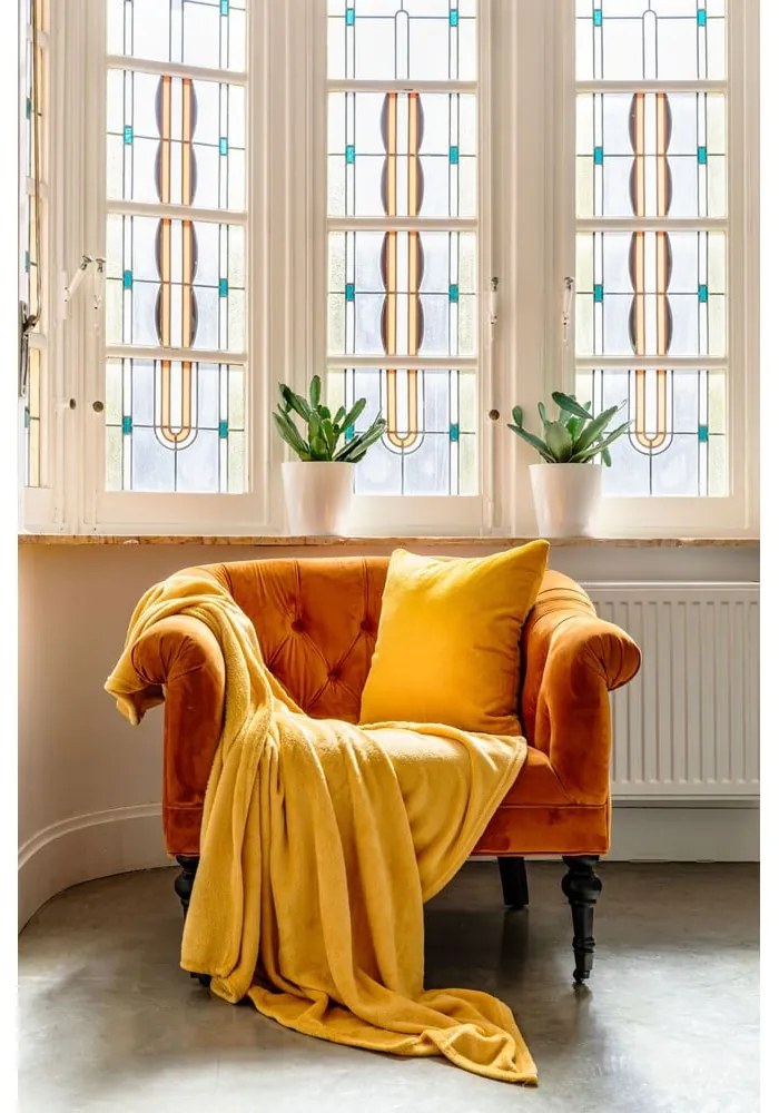 Żółta narzuta z mikropluszu na łóżko jednoosobowe 150x200 cm Cosy – Tiseco Home Studio