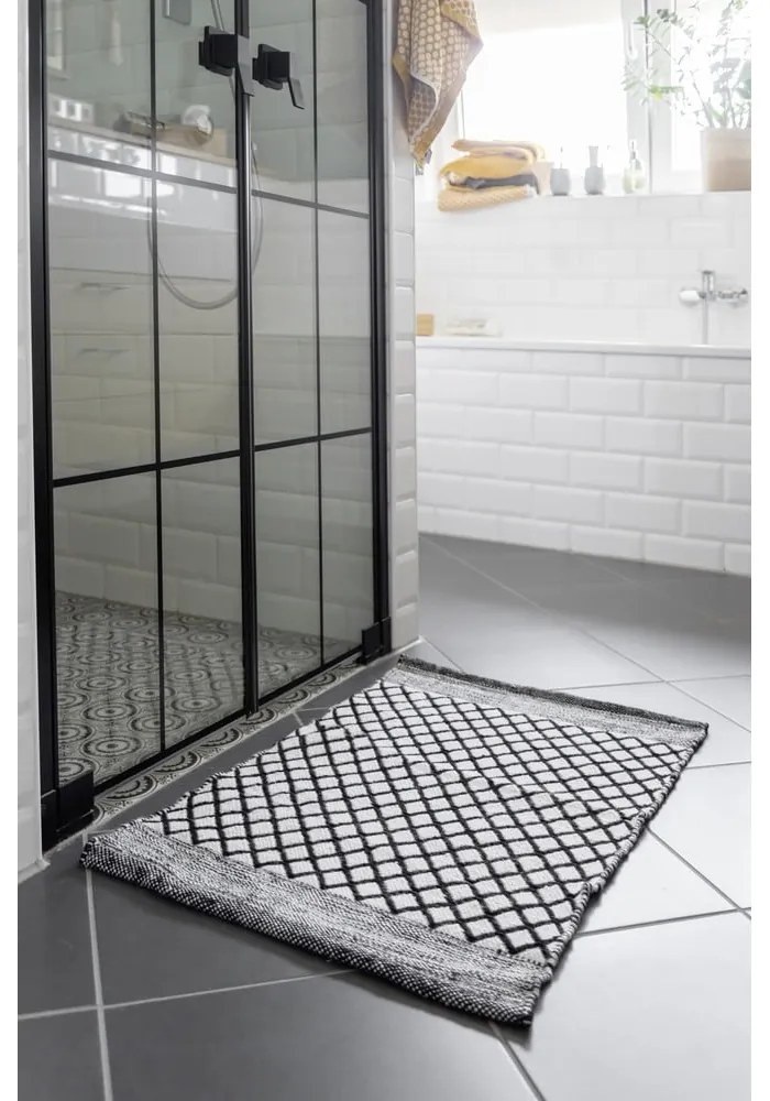 Czarno-biały dywanik łazienkowy z plastiku z recyklingu 50x80 cm Tara – Wenko