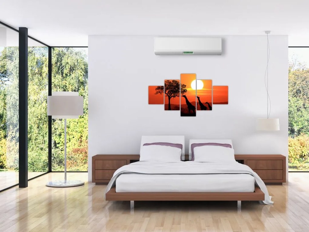 Obraz żyraf o zachodzie słońca (125x70 cm)