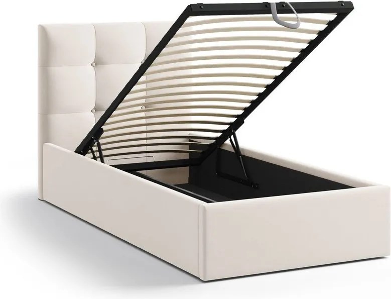 Kremowe tapicerowane łóżko jednoosobowe ze schowkiem i stelażem 90x200 cm Phaedra – Micadoni