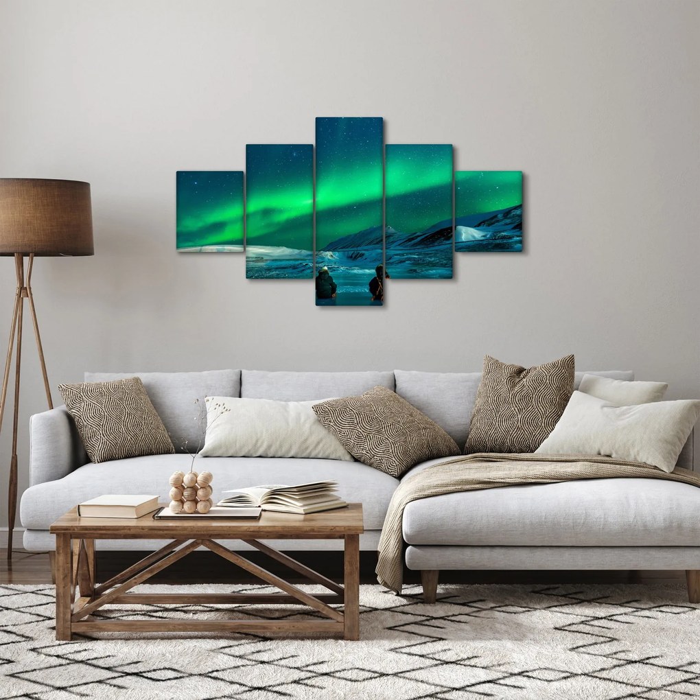 Obraz ludzi w pobliżu zorzy polarnej (125x70 cm)