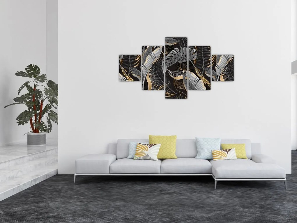 Obraz - Tropikalne liście w kolorze czarno - złotym (125x70 cm)