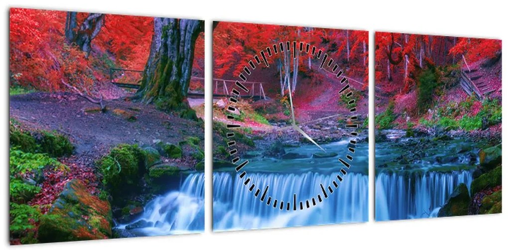 Obraz wodospadu w czerwonym lesie (z zegarem) (90x30 cm)