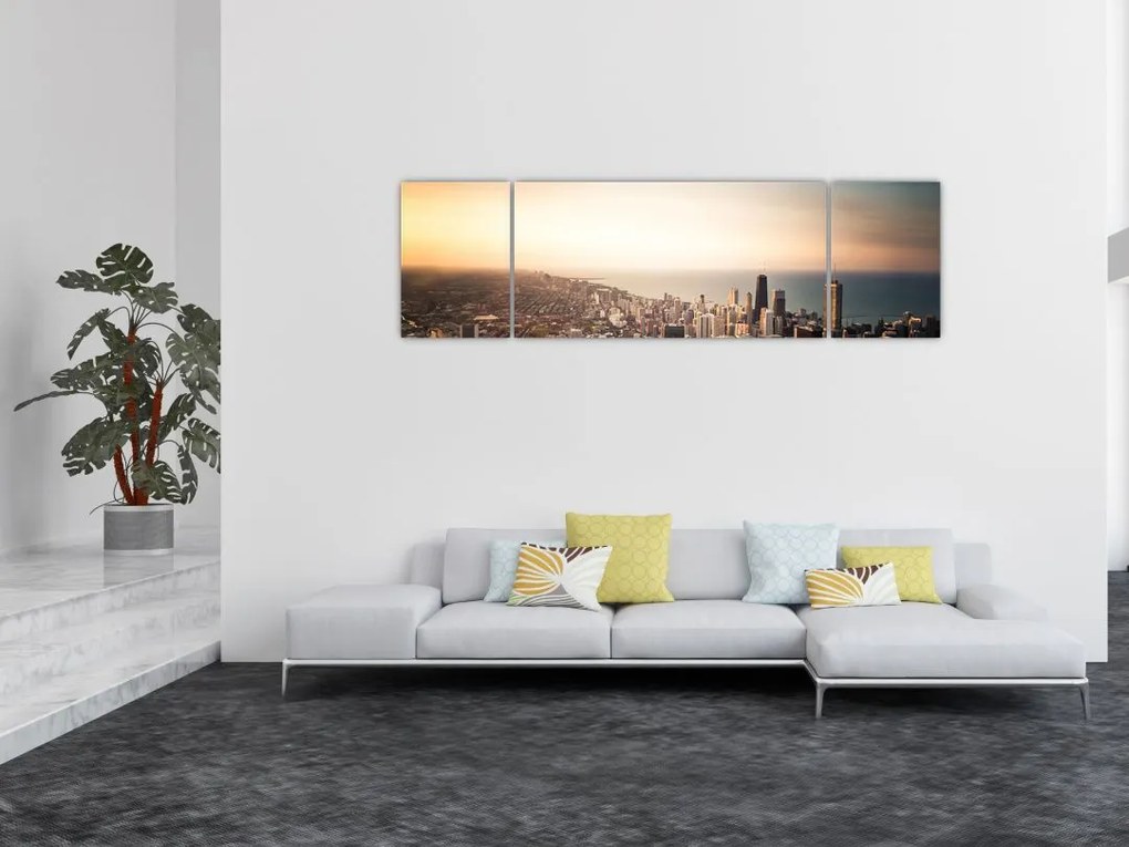 Obraz zachodu słońca nad miastem (170x50 cm)