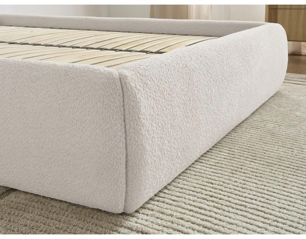 Białe tapicerowane łóżko dwuosobowe bez zagłówka ze schowkiem i stelażem 180x200 cm Inera – Bobochic Paris