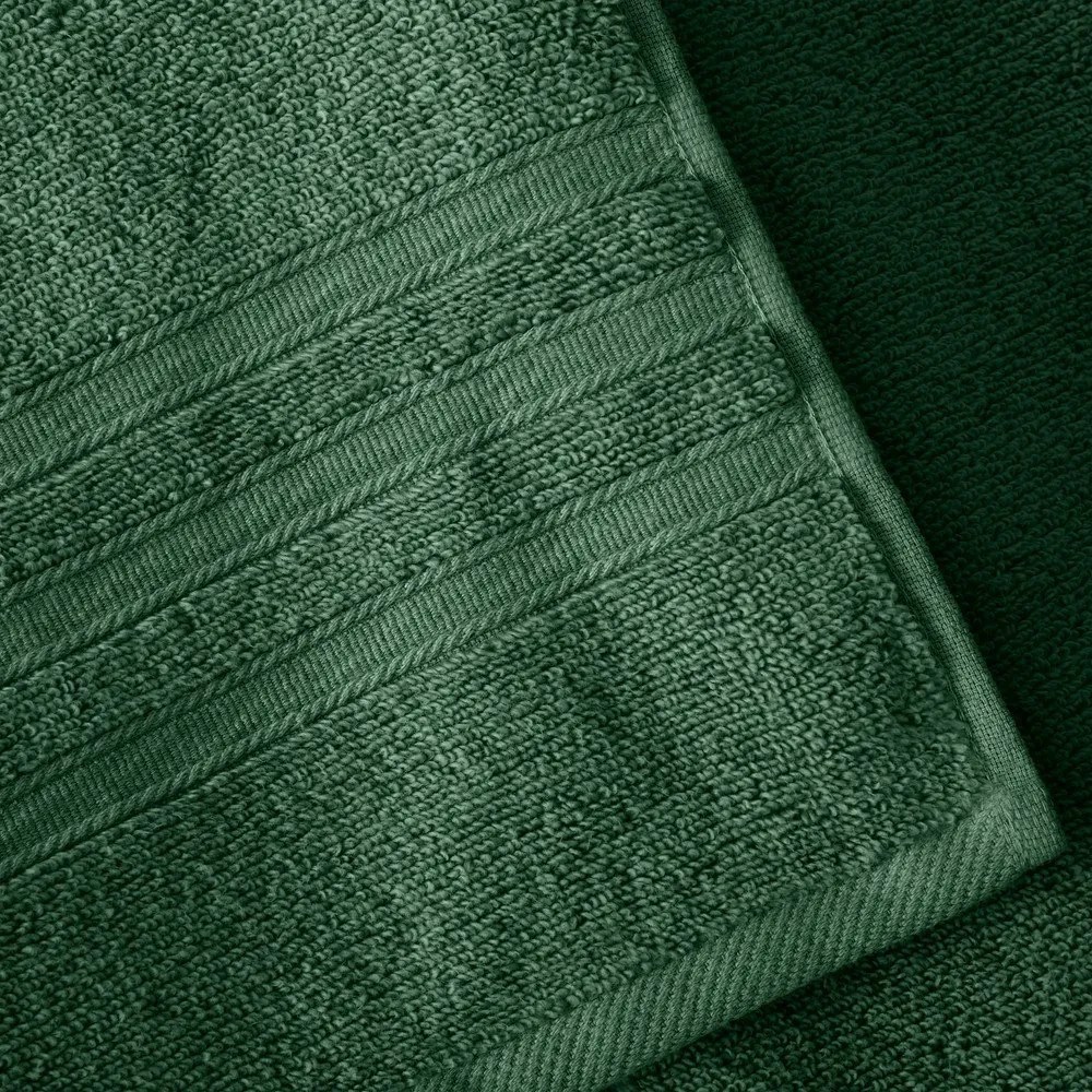 Ciemnozielony bawełniany ręcznik frotte 50x85 cm Zero Twist – Catherine Lansfield