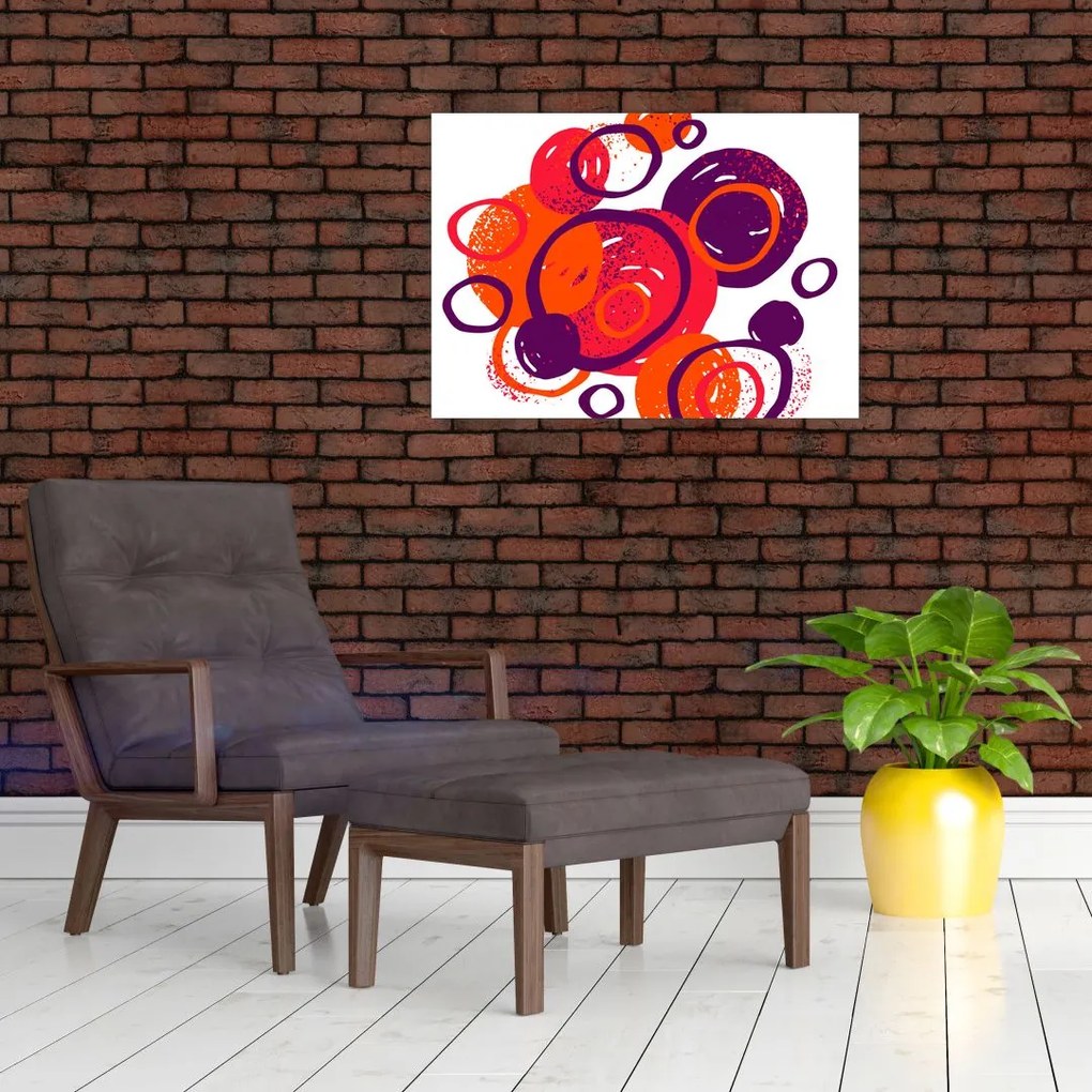 Obraz na szkle - Motyw z kółkami w ciepłych kolorach (70x50 cm)